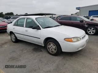 ✅ 1999 Ford Escort LX • VIN: 1FAFP10P7XW221648 • Lot: 71844334. Wystawiony na Copart z przebiegiem 140 899 mil. Bezpłatny archiwum sprzedaży aukcyjnych z USA i szczegółowy raport historii pojazdu na DreamBid. Zdjęcie 4.