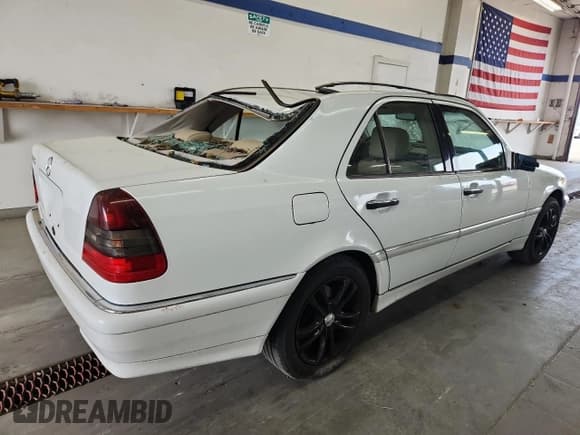 ✅ 1999 Mercedes-Benz C 230/260/280/320 • VIN: WDBHA29G7XA709264 • Lot: 59676075. Listed on Copart with 156,393 mi. Free auction sales archive from the USA and detailed vehicle history report at DreamBid. Image 3.