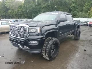 ✅ 2018 GMC Sierra 1500 Denali • VIN: 3GTU2PEC4JG260891 • Лот: 80831425. Опубликован ранее на Copart с пробегом 99 798 миль. Бесплатный доступ к архиву аукционных продаж из США и подробный отчёт об истории автомобиля на DreamBid. Изображение 1.