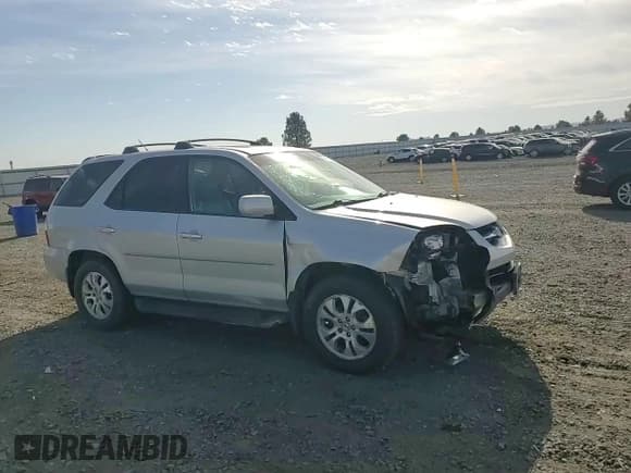 ✅ 2003 Acura MDX Touring • VIN: 2HNYD18663H553770 • Lot: 85913255. Wystawiony na Copart z przebiegiem 182 756 mil. Bezpłatny archiwum sprzedaży aukcyjnych z USA i szczegółowy raport historii pojazdu na DreamBid. Zdjęcie 14.