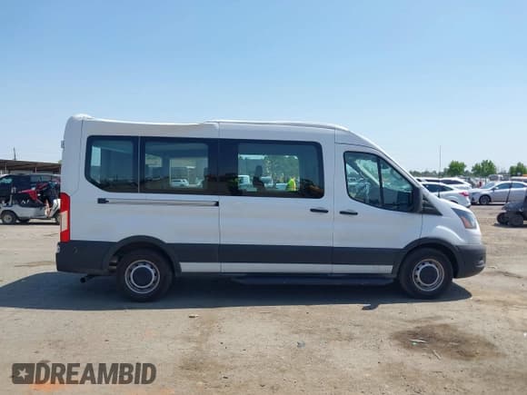 ✅ 2023 Ford Transit Passenger XL • VIN: 1FBAX2CG7PKC04821 • Lot: 42379783. Listed on IAAI with 15,909 mi. Free auction sales archive from the USA and detailed vehicle history report at DreamBid. Image 13.