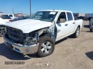✅ 2023 Ram 1500 Tradesman • VIN: 3C6RR7KG2PG662465 • Lot: 41596581. Listed on IAAI with 21,311 mi. Free auction sales archive from the USA and detailed vehicle history report at DreamBid. Image 2.