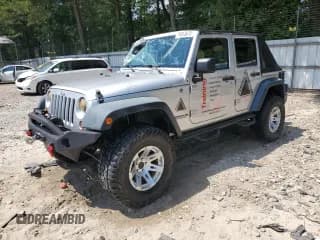 ✅ 2009 Jeep Wrangler Unlimited X • VIN: 1J4GA391X9L786887 • Лот: 70853675. Опубликован ранее на Copart с пробегом 130 403 миль. Бесплатный доступ к архиву аукционных продаж из США и подробный отчёт об истории автомобиля на DreamBid. Изображение 1.