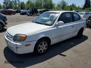 ✅ 2005 Hyundai Accent GLS • VIN: KMHCG35C75U353506 • Лот: 63022545. Опубликован ранее на Copart с пробегом 143 246 миль. Бесплатный доступ к архиву аукционных продаж из США и подробный отчёт об истории автомобиля на DreamBid. Изображение 1.