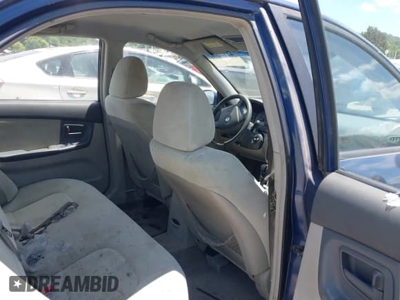 ✅ 2005 Kia Spectra LX • VIN: KNAFE121555167534 • Lot: 42722762. Wystawiony na IAAI z przebiegiem 181 953 mil. Bezpłatny archiwum sprzedaży aukcyjnych z USA i szczegółowy raport historii pojazdu na DreamBid. Zdjęcie 8.