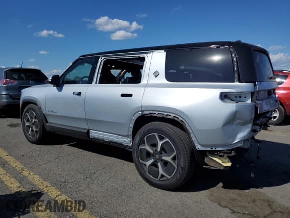 ✅ 2024 Rivian R1S Adventure • VIN: 7PDSGBBA4RN036045 • Lot: 74982414. Listed on Copart with 9,256 mi. Free auction sales archive from the USA and detailed vehicle history report at DreamBid. Image 2.