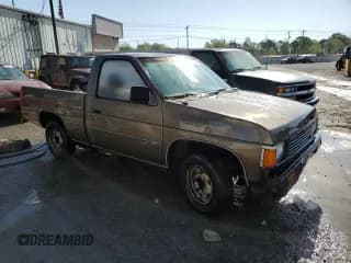 ✅ 1986 Nissan Hardbody E • VIN: JN6ND11S6GW032617 • Lot: 52494125. Wystawiony na Copart z przebiegiem 269 921 mil. Bezpłatny archiwum sprzedaży aukcyjnych z USA i szczegółowy raport historii pojazdu na DreamBid. Zdjęcie 4.