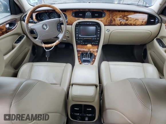 ✅ 2005 Jaguar XJ 8 LWB • VIN: SAJWA79C65SG34572 • Лот: 93790045. Опубликован ранее на Copart с пробегом 148 958 миль. Бесплатный доступ к архиву аукционных продаж из США и подробный отчёт об истории автомобиля на DreamBid. Изображение 8.