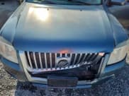 ✅ 2010 Mercury Mariner Premier • VIN: 4M2CN8H75AKJ05521 • Lot: 58830595. Listed on Copart with 180,298 mi. Free auction sales archive from the USA and detailed vehicle history report at DreamBid. Image 12.