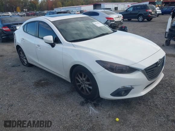 ✅ 2016 Mazda 3 i Touring • VIN: JM1BM1W72G1348510 • Lot: 43522040. Listed on IAAI with 140,008 mi. Free auction sales archive from the USA and detailed vehicle history report at DreamBid. Image 1.