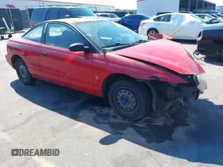 ✅ 1997 Saturn SC • VIN: 1G8ZF1280VZ261592 • Лот: 43468001. Опубликован ранее на IAAI с пробегом 220 986 миль. Бесплатный доступ к архиву аукционных продаж из США и подробный отчёт об истории автомобиля на DreamBid. Изображение 1.