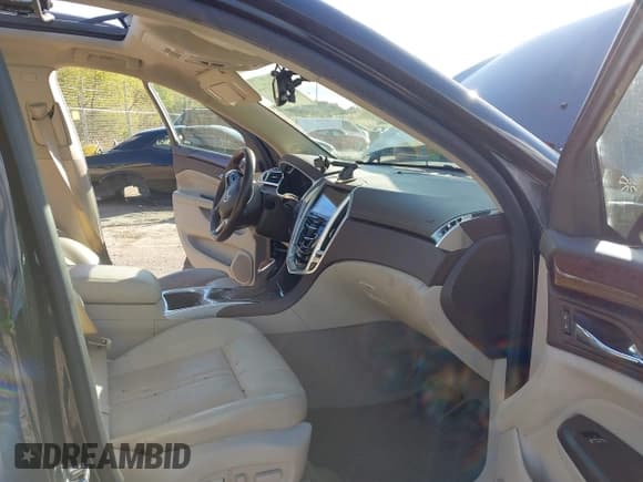 ✅ 2016 Cadillac SRX Luxury Collection • VIN: 3GYFNEE32GS570414 • Lot: 43403544. Listed on IAAI with 142,993 mi. Free auction sales archive from the USA and detailed vehicle history report at DreamBid. Image 5.