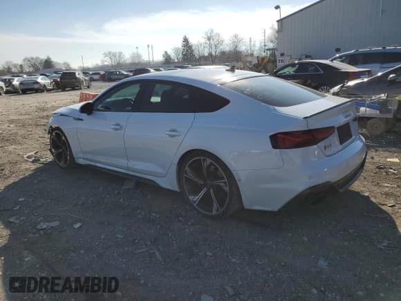 ✅ 2023 Audi RS 5 Sportback • VIN: WUAAWCF55PA900214 • Лот: 42182554. Опубликован ранее на Copart с пробегом 13 302 миль. Бесплатный доступ к архиву аукционных продаж из США и подробный отчёт об истории автомобиля на DreamBid. Изображение 2.