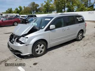 2012 Dodge Grand Caravan SXT z VIN 2C4RDGCG9CR178979, wystawiony jako Copart lot #70486195 z przebiegiem 276 546 mil mil oraz Szkoda całkowita • Salvage title. Historia ofert i sprzedaży dostępna na DreamBid. Obrazek 1.