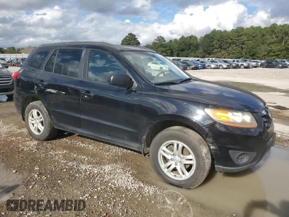 ✅ 2011 Hyundai Santa Fe GLS • VIN: 5XYZGDAB9BG025664 • Лот: 85516005. Опубликован ранее на Copart с пробегом 159 925 миль. Бесплатный доступ к архиву аукционных продаж из США и подробный отчёт об истории автомобиля на DreamBid. Изображение 4.