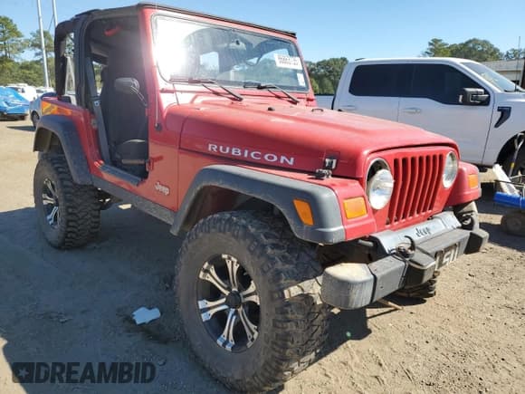 ✅ 2003 Jeep Wrangler Rubicon • VIN: 1J4FA69S43P373014 • Lot: 86863735. Listed on Copart with 120,127 mi. Free auction sales archive from the USA and detailed vehicle history report at DreamBid. Image 4.