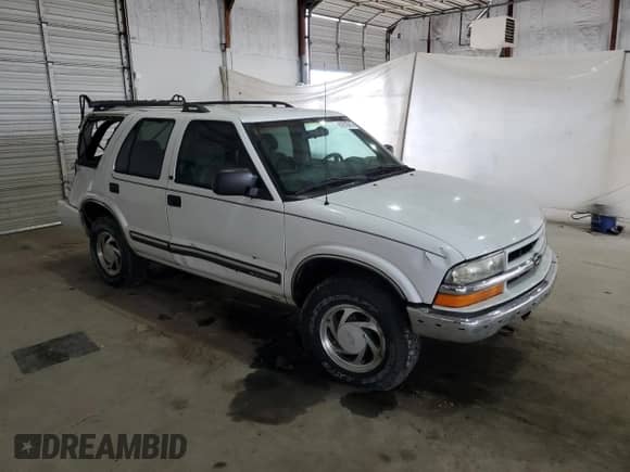 2001 Chevrolet Blazer LT с VIN 1GNDT13W91K224444, выставлен на аукционе Copart как лот 81615015 с пробегом 225 699 миль миль и Списание • Salvage title. История ставок и продаж доступна на DreamBid. Изображение 4.
