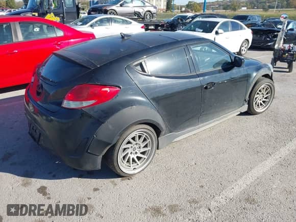 2013 Hyundai Veloster w/Black Int с VIN KMHTC6AD2DU092229, выставлен на аукционе IAAI как лот 43601459 с пробегом 191 710 миль миль и . История ставок и продаж доступна на DreamBid. Изображение 4.
