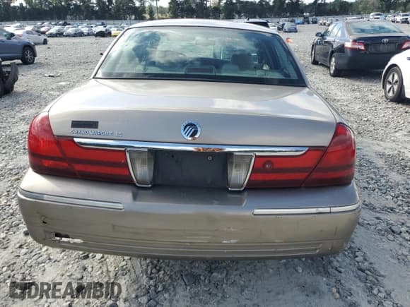 ✅ 2003 Mercury Grand Marquis LS Premium • VIN: 2MEHM75W73X608020 • Лот: 84363205. Опубликован ранее на Copart с пробегом 220 703 миль. Бесплатный доступ к архиву аукционных продаж из США и подробный отчёт об истории автомобиля на DreamBid. Изображение 6.