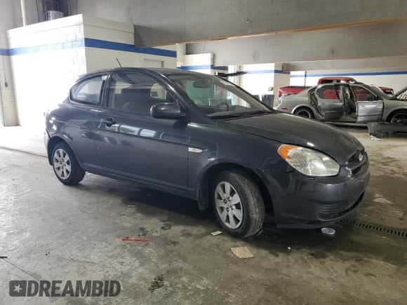 ✅ 2010 Hyundai Accent GS • VIN: KMHCM3AC5AU157783 • Лот: 56324555. Опубликован ранее на Copart с пробегом 210 280 миль. Бесплатный доступ к архиву аукционных продаж из США и подробный отчёт об истории автомобиля на DreamBid. Изображение 4.