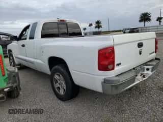 2005 Dodge Dakota z VIN 1D7HE52N95S230132, wystawiony jako Copart lot #77028954 z przebiegiem 176 280 mil mil oraz Nie do naprawy • Non repairable. Historia ofert i sprzedaży dostępna na DreamBid. Obrazek 2.