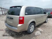 ✅ 2009 Dodge Grand Caravan SE • VIN: 2D8HN44E89R687315 • Lot: 42286929. Listed on IAAI with 215,894 mi. Free auction sales archive from the USA and detailed vehicle history report at DreamBid. Image 4.