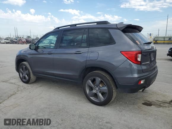 ✅ 2021 Honda Passport Touring • VIN: 5FNYF8H93MB028255 • Lot: 67320475. Listed on Copart with 92,692 mi. Free auction sales archive from the USA and detailed vehicle history report at DreamBid. Image 2.