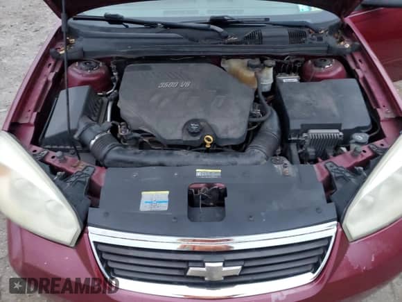 2007 Chevrolet Malibu LS with VIN 1G1ZS57NX7F156630, listed as a Copart auction lot 81242134 with 180,398 mi miles and Salvage title. Bid and sale history available at DreamBid. Image 11.