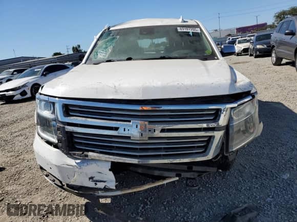 2020 Chevrolet Tahoe Premier z VIN 1GNSCCKC3LR153004, wystawiony jako Copart lot #63107205 z przebiegiem 42 611 mil mil oraz Nie do naprawy • Non repairable. Historia ofert i sprzedaży dostępna na DreamBid. Obrazek 5.