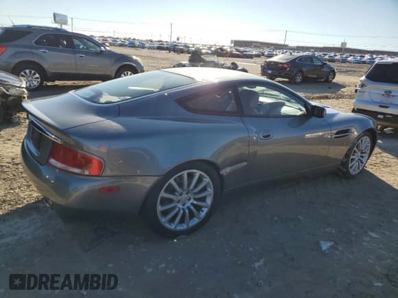 ✅ 2003 Aston Martin Vanquish • VIN: SCFAC23393B501038 • Lot: 83414004. Wystawiony na Copart z przebiegiem 22 849 mil. Bezpłatny archiwum sprzedaży aukcyjnych z USA i szczegółowy raport historii pojazdu na DreamBid. Zdjęcie 3.
