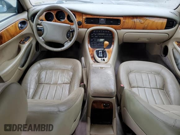 ✅ 1998 Jaguar XJ • VIN: SAJHX6243WC827873 • Lot: 78366904. Listed on Copart with Not provided. Free auction sales archive from the USA and detailed vehicle history report at DreamBid. Image 8.