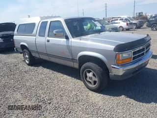 1991 Dodge Dakota with VIN 1B7GG23X9MS351515, listed as a IAAI auction lot 42853981 with 197,406 mi miles and . Bid and sale history available at DreamBid. Image 1.
