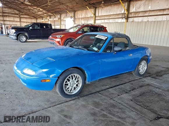 ✅ 1990 Mazda MX-5 Miata • VIN: JM1NA3512L0151562 • Lot: 94551275. Listed on Copart with 203,707 mi. Free auction sales archive from the USA and detailed vehicle history report at DreamBid. Image 1.