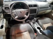 ✅ 2010 Mercury Milan Hybrid • VIN: 3MEDM0L32AR659094 • Lot: 53280235. Wystawiony na Copart z przebiegiem 127 393 mil. Bezpłatny archiwum sprzedaży aukcyjnych z USA i szczegółowy raport historii pojazdu na DreamBid. Zdjęcie 8.