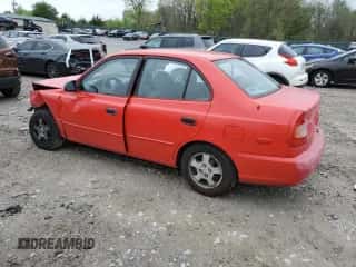 2001 Hyundai Accent GL z VIN KMHCG45C81U219104, wystawiony jako Copart lot #51597985 z przebiegiem 157 597 mil mil oraz Szkoda całkowita • Salvage title. Historia ofert i sprzedaży dostępna na DreamBid. Obrazek 2.
