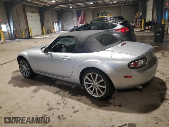 ✅ 2006 Mazda MX-5 Miata Touring • VIN: JM1NC25F360121863 • Lot: 88010315. Wystawiony na Copart z przebiegiem 39 541 mil. Bezpłatny archiwum sprzedaży aukcyjnych z USA i szczegółowy raport historii pojazdu na DreamBid. Zdjęcie 2.
