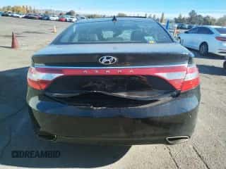 2012 Hyundai Azera z VIN KMHFH4JG0CA190690, wystawiony jako Copart lot #79657044 z przebiegiem Nie podano mil oraz Szkoda całkowita • Salvage title. Historia ofert i sprzedaży dostępna na DreamBid. Obrazek 6.