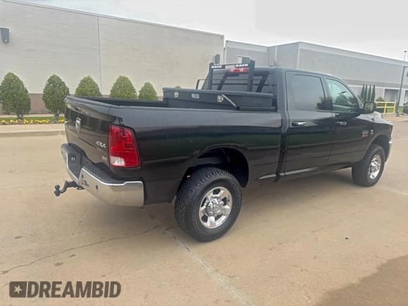 ✅ 2012 Ram 2500 SLT • VIN: 3C6UD5DL4CG172014 • Lot: 95305445. Listed on Copart with 17,956 mi. Free auction sales archive from the USA and detailed vehicle history report at DreamBid. Image 4.