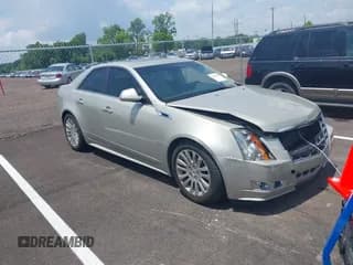 ✅ 2013 Cadillac CTS Performance • VIN: 1G6DK5E31D0146699 • Lot: 42426214. Listed on IAAI with 96,520 mi. Free auction sales archive from the USA and detailed vehicle history report at DreamBid. Image 1.