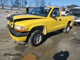 1999 Dodge Dakota with VIN 1B7GG26X4XS148631, listed as a Copart auction lot 41374055 with 304,160 mi miles and Salvage title. Bid and sale history available at DreamBid. Image 1.