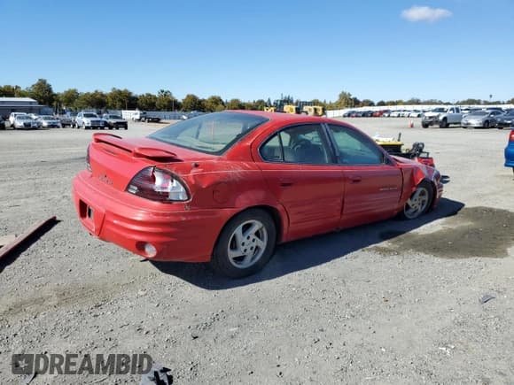 ✅ 1999 Pontiac Grand Am SE1 • VIN: 1G2NE52E7XM780440 • Lot: 82715635. Listed on Copart with Not provided. Free auction sales archive from the USA and detailed vehicle history report at DreamBid. Image 3.