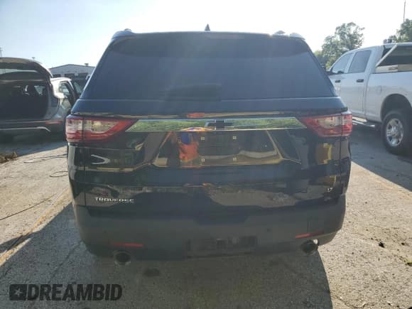 ✅ 2021 Chevrolet Traverse LT • VIN: 1GNERHKW2MJ174025 • Lot: 60928705. Wystawiony na Copart z przebiegiem 60 123 mil. Bezpłatny archiwum sprzedaży aukcyjnych z USA i szczegółowy raport historii pojazdu na DreamBid. Zdjęcie 6.