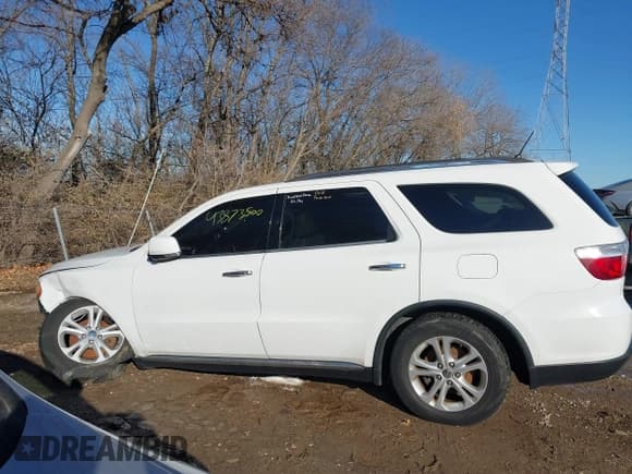 ✅ 2013 Dodge Durango Crew • VIN: 1C4RDJDG4DC665092 • Lot: 43873500. Listed on IAAI with 141,905 mi. Free auction sales archive from the USA and detailed vehicle history report at DreamBid. Image 14.