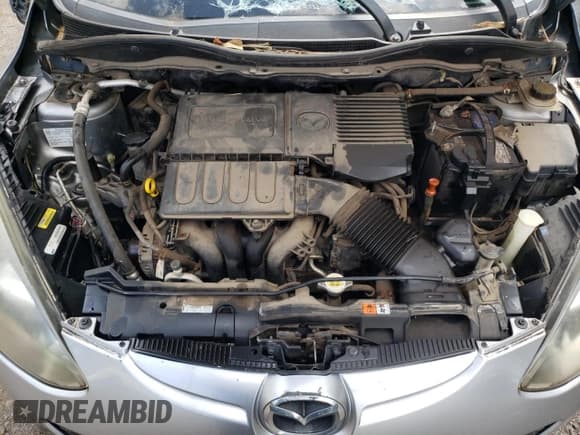 ✅ 2014 Mazda 2 Sport • VIN: JM1DE1KY0E0185671 • Lot: 65857865. Wystawiony na Copart z przebiegiem 123 988 mil. Bezpłatny archiwum sprzedaży aukcyjnych z USA i szczegółowy raport historii pojazdu na DreamBid. Zdjęcie 11.