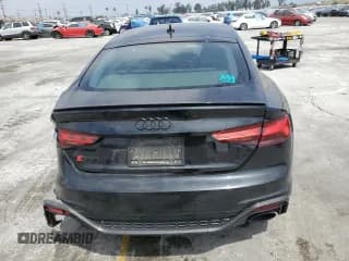 ✅ 2021 Audi RS 5 Sportback • VIN: WUAAWCF53MA904838 • Lot: 56450664. Wystawiony na Copart z przebiegiem 46 020 mil. Bezpłatny archiwum sprzedaży aukcyjnych z USA i szczegółowy raport historii pojazdu na DreamBid. Zdjęcie 6.