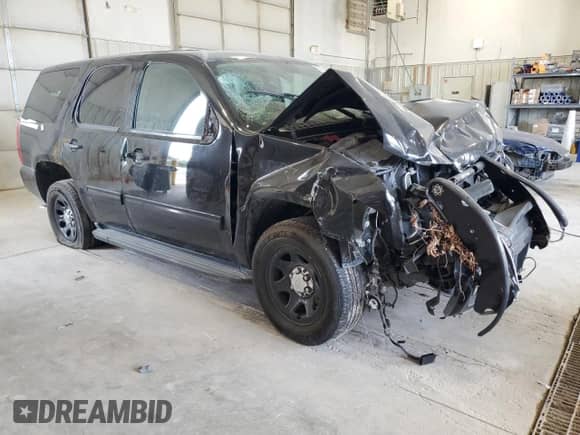 2013 Chevrolet Tahoe Commercial с VIN 1GNLC2E06DR339959, выставлен на аукционе Copart как лот 80303465 с пробегом 124 716 миль миль и Списание • Salvage title. История ставок и продаж доступна на DreamBid. Изображение 4.