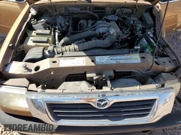 ✅ 1999 Mazda B-Series SE • VIN: 4F4YR16V3XTM00734 • Lot: 67861575. Listed on Copart with 87,169 mi. Free auction sales archive from the USA and detailed vehicle history report at DreamBid. Image 11.