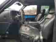 2001 Chevrolet Silverado 1500 LT z VIN 1GCEC19T31Z192995, wystawiony jako Copart lot #55569865 z przebiegiem 238 730 mil mil oraz Szkoda całkowita • Salvage title. Historia ofert i sprzedaży dostępna na DreamBid. Obrazek 7.