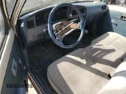 ✅ 1990 Toyota Pickup • VIN: JT4RN81A8L0045321 • Lot: 61399095. Listed on Copart with 238,214 mi. Free auction sales archive from the USA and detailed vehicle history report at DreamBid. Image 8.