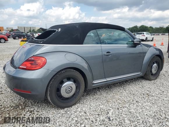 ✅ 2013 Volkswagen Beetle 2.5L • VIN: 3VW5X7AT6DM821140 • Лот: 62769875. Опубликован ранее на Copart с пробегом 101 709 миль. Бесплатный доступ к архиву аукционных продаж из США и подробный отчёт об истории автомобиля на DreamBid. Изображение 3.